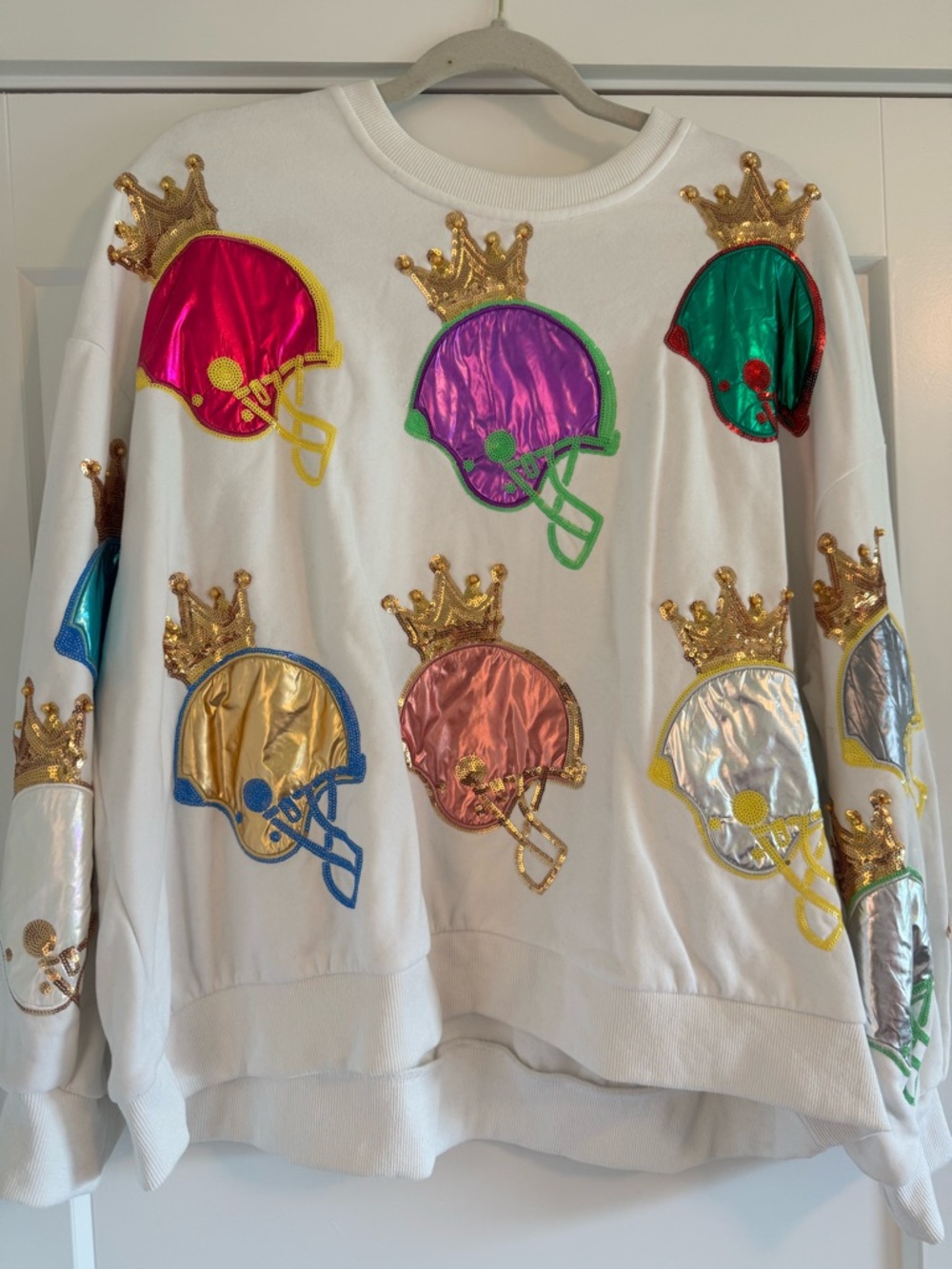 Queen of Sparkles Pullover Sweatshirt with Multicolor Metallic Helmet Appliqué